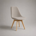 Sedia imbottita in poliestere beige con piedi in faggio massiccio, dorso curvo, 48 × 55 × 84 cm